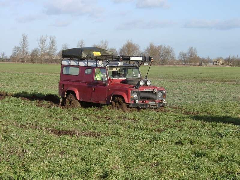 Land-Rover stuck in a muddy field