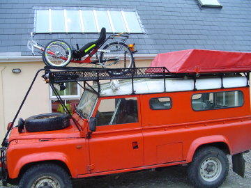 Land Rover with trike and tent